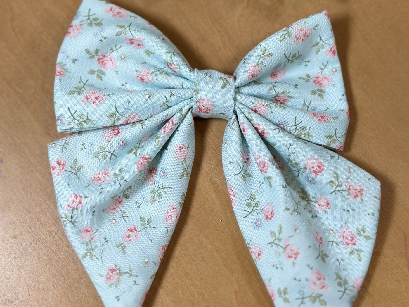 Handmade powder-blue sailor bow with pink cottage roses