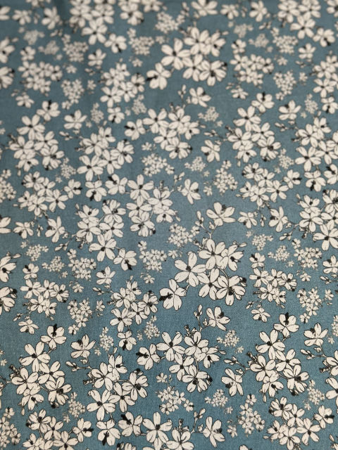 Daisies on Teal fabric
