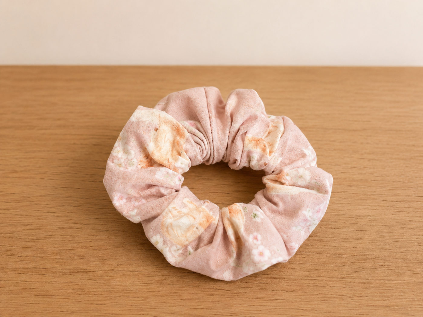 Handmade scrunchie in a peachy-pink kitten print