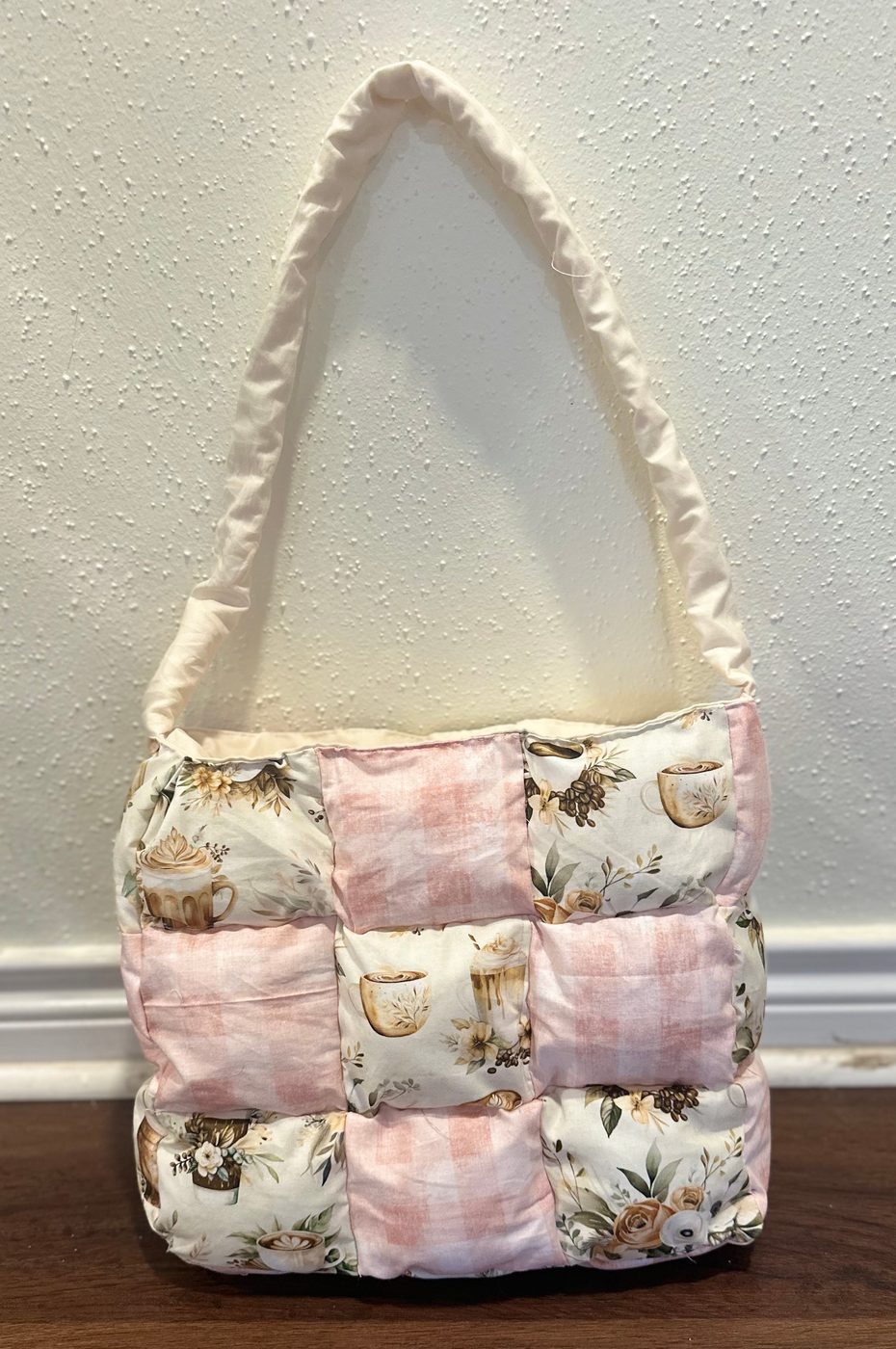 Handmade puff tote made from stuffed squares in coffee-cup and blush gingham prints, with cream straps