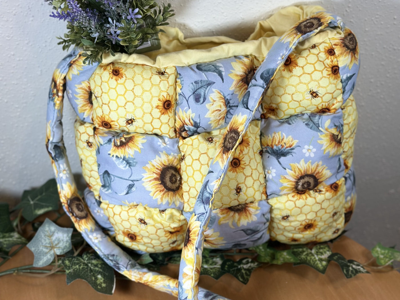 Handmade puffy woven tote in a sunflower, honeycomb, and bee print